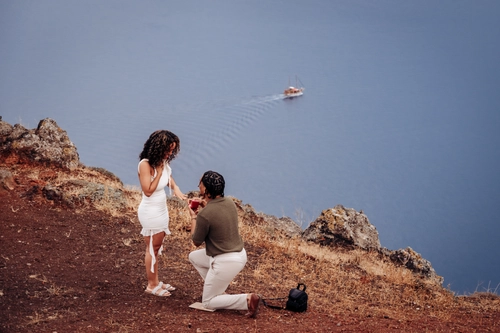 Santorini Secret Proposal Experience with Hidden Photographer & Private Transfer