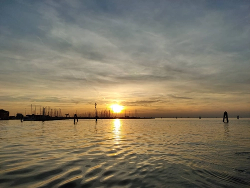 Sunset in the Venetian Lagoon from the Boat