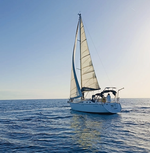 Sunset Aperitif on a Sailing Boat
