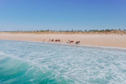 HORSE RIDING ON THE BEACH